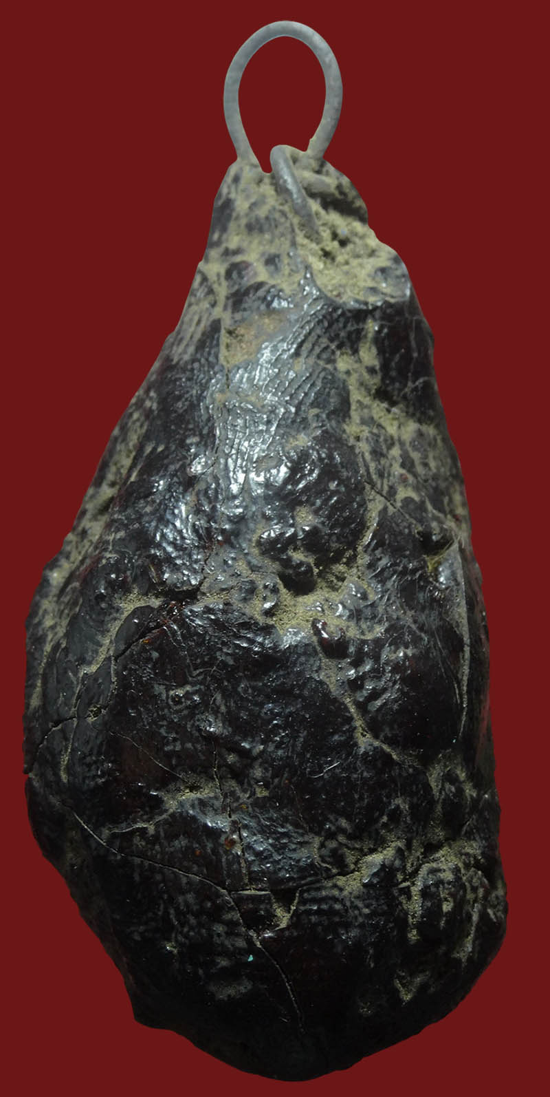 ตะกรุดเครื่องรางพอกครั่ง