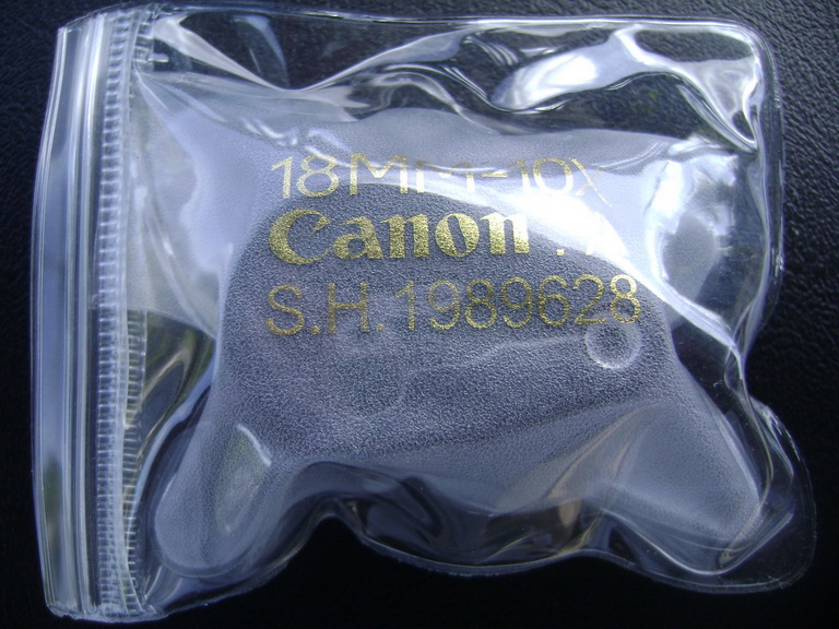  กล้อง cannon 10x ใหม่ยังไม่ได้แกะ (ก้านดำ) เคาะเดียว