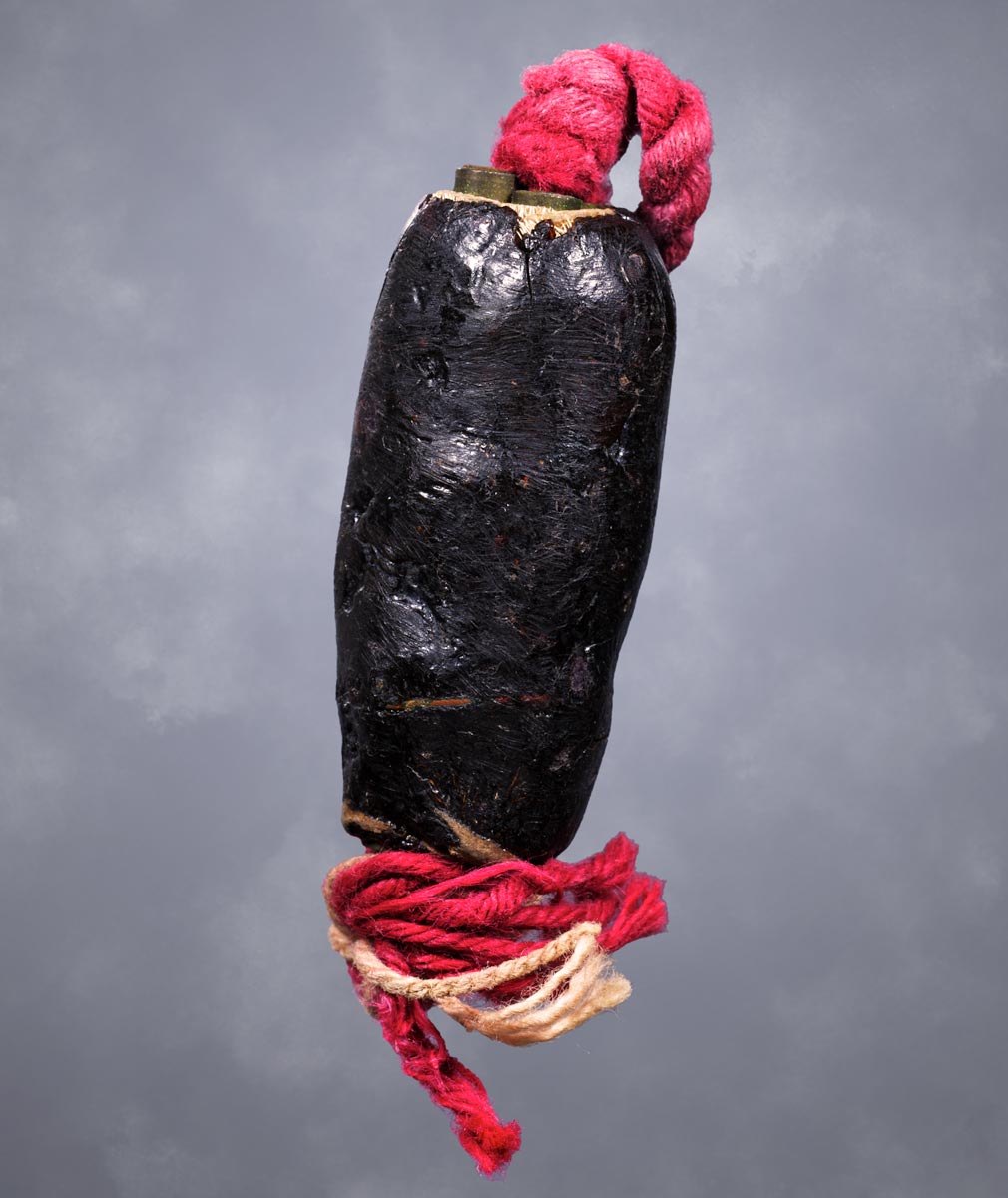 ตะกรุดหนังควายเผือกพอกครั่งครูบาชุ่ม