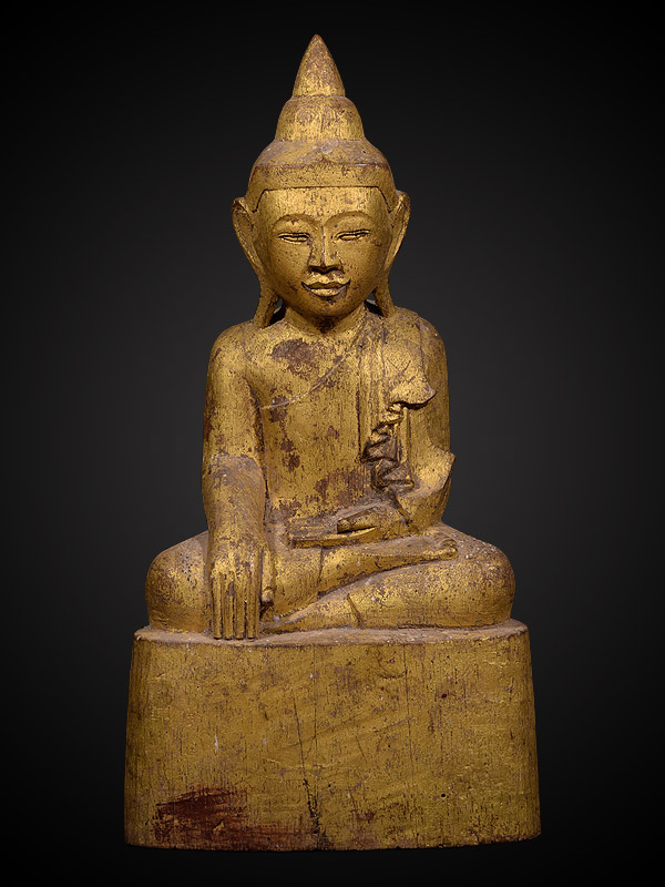 พระพุทธรูปไม้แกะศิลปะไทลื้อผสมไทยใหญ่