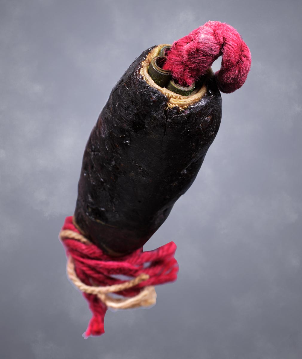 ตะกรุดหนังควายเผือกพอกครั่งครูบาชุ่ม